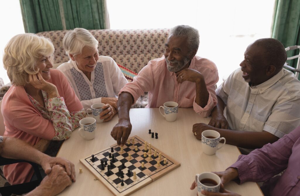 Group of senior citizens playing chess